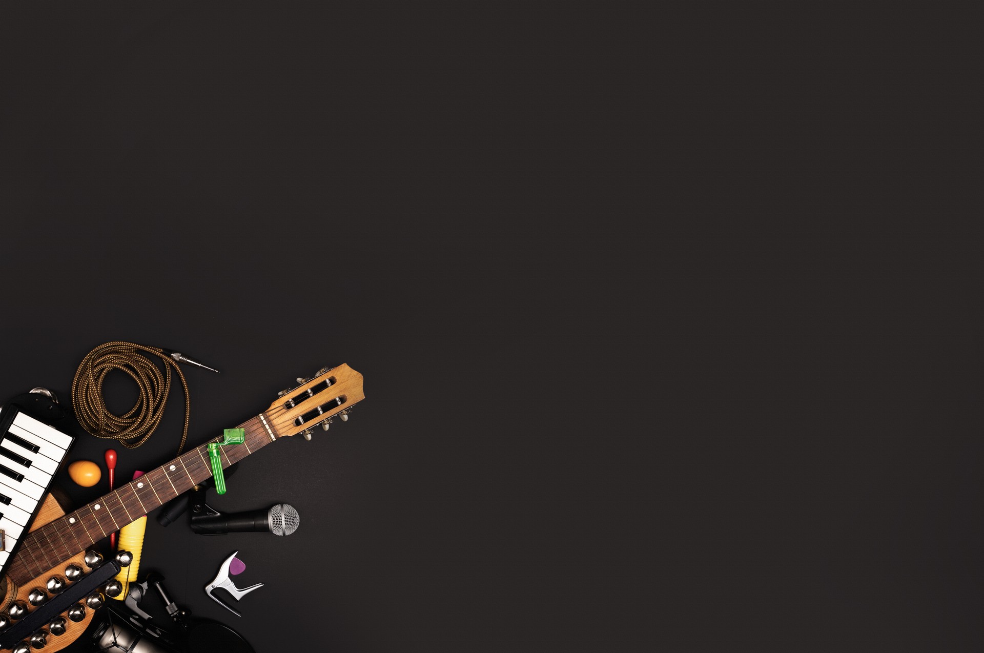 Musician's Desktop with Instruments and Recording Gear background